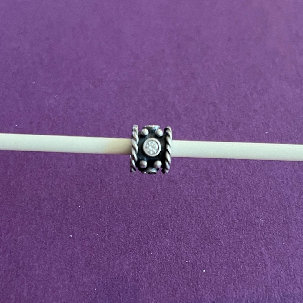 Pandora Sterling Silver Oxy Crown charm with clear CZ stones.
